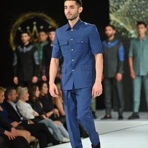 Blue Formal Wear Full Sleeve Safari Suit For Men.