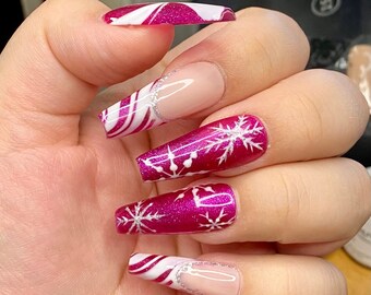 Barbie pink Christmas nails French tip styled in long ballerina