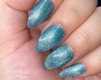 Velvet nails- crystal nails-green velvet diamond press on nails styled in medium almond