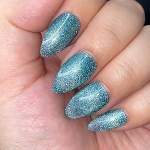 Velvet nails- crystal nails-green velvet diamond press on nails styled in medium almond