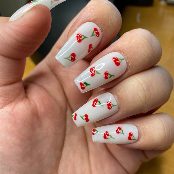 CHERRY BOMB! Cherry nail art press on nails- Milky White Nails styled in medium ballerina