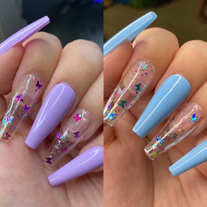 Baby blue butterfly nails | Lilac butterfly nails | confetti glitter accent press on nails styled in long ballerina