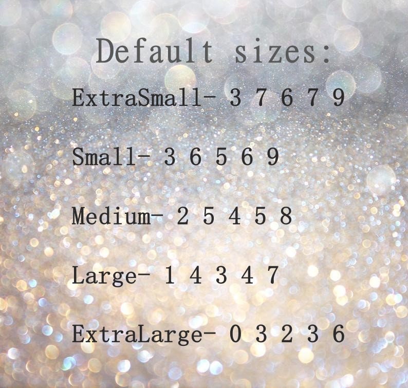 May include: A chart showing default sizes for clothing with the following sizes: Extra Small, Small, Medium, Large, and Extra Large. The sizes are listed with corresponding numbers.