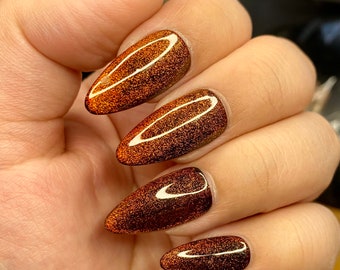 Orange black crystal magnetic cat eye press on nails Velvet Nails styled in long coffin