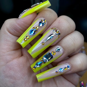 Neon yellow v French tip press on rhinestone nails-styled in long square