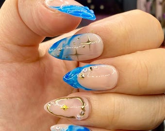 Blue Marble French Tip Press On Nails: Gold Accent Almond Jelly Nails