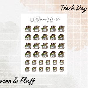 May include: A sheet of stickers featuring a repeating pattern of brown grocery bags with green produce and a smiling face. The text "Trash Day" is at the top right, and "Cocoa & Fluff" is at the bottom left.