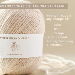May include: A beige ball of yarn with a white label that says "YOUR BRAND NAME" and features a drawing of a fluffy rabbit. The label also includes the text "YOUR TAGLINE/DETAILS". The text "You can request any change of: colour, text, design (arrangement, adding/removing elements)" is visible on the right side of the image.