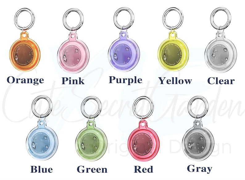 May include: A collection of AirTag holders in various colors, including orange, pink, purple, yellow, clear, blue, green, red, and gray. Each holder has a silver ring for attachment and the color name is printed below.