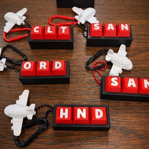 Airport Code Keyboard Clicker: Mechanical Key Fidget Toy, Travel Keychain