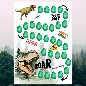 May include: A white paper with a dinosaur-themed game board. The board features a Tyrannosaurus Rex illustration, green egg graphics, and motivational phrases like "You Can Do It" and "Keep Going".