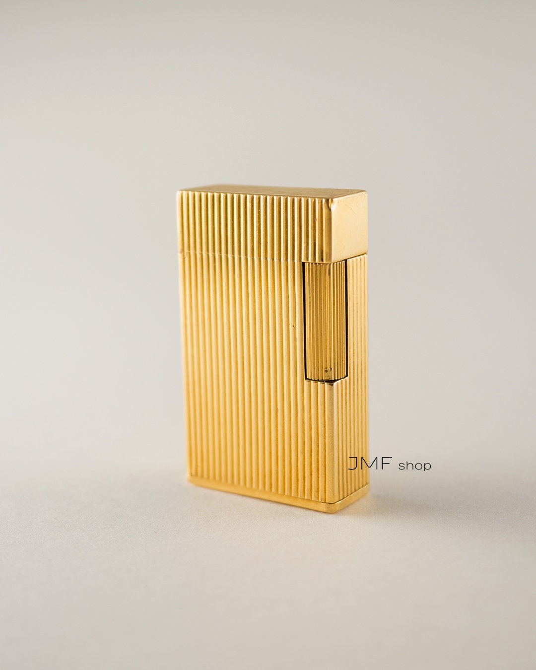 Retro and Vintage “Gucci” Gold Lather Lighter 80's circa For Sale at 1stDibs