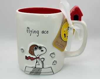 Snoopy flying ace mug by Rae Dunn | Snoopy in his aviator attire with Snoopy's iconic red doghouse