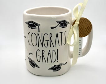 CONGRATS GRAD coffee mug with adorned graduation cap pattern by Rae Dunn | Great gift for the 2026 Graduate