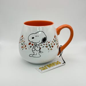 Peanuts Snoopy fall mug | Snoopy round-bellied mug with fall leaves | Happy Fall! mug with Snoopy surrounded by falling leaves
