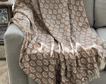 Manta de algodón estilo boho hecha a mano con borlas