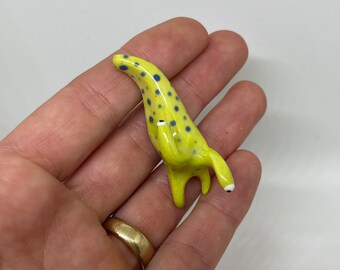 Imán de verdes con manchas azules