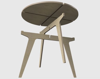 May include: A light wood table with a round top and four legs. The table is made of plywood and has a simple, modern design.