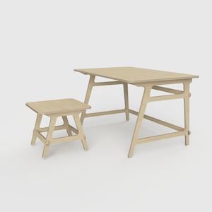 May include: A light wood desk with a simple design and a matching stool. The desk has a rectangular top and a frame with angled legs. The stool has a square top and a similar frame with angled legs.