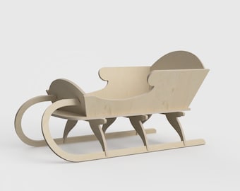 May include: A wooden sleigh with a curved back and a wide base. The sleigh is made of light-colored wood and has a natural finish.