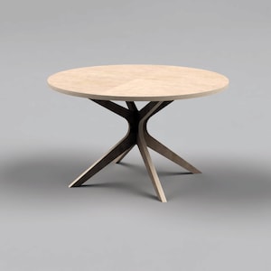 May include: A round wooden table with a light brown top and a unique X-shaped base made of the same wood.