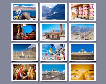 May include: A set of cards displaying various images related to Buddhism, including temples and landscapes. The cards are arranged in a grid and feature the text "LAND OF BUDDHISM" and "CARDS WITH ENVELOPE". The images are rich in colour and detail.