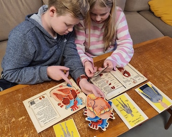 Montessori-puzzels menselijk lichaam: skelet, organen, hart - set van 3