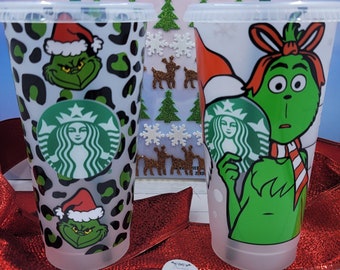 Christmas Starbucks 24oz reusable cold cup with lid and straw.