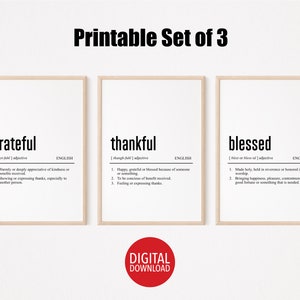 May include: Set of three framed prints with the words "grateful", "thankful", and "blessed" in black text on a white background. Each print includes a definition. The phrase "Printable Set of 3" is at the top.