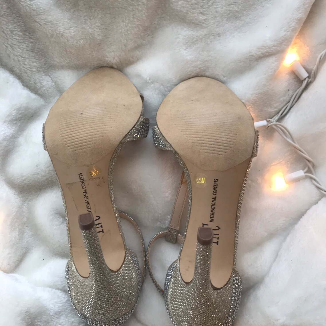 silver high heels with bow