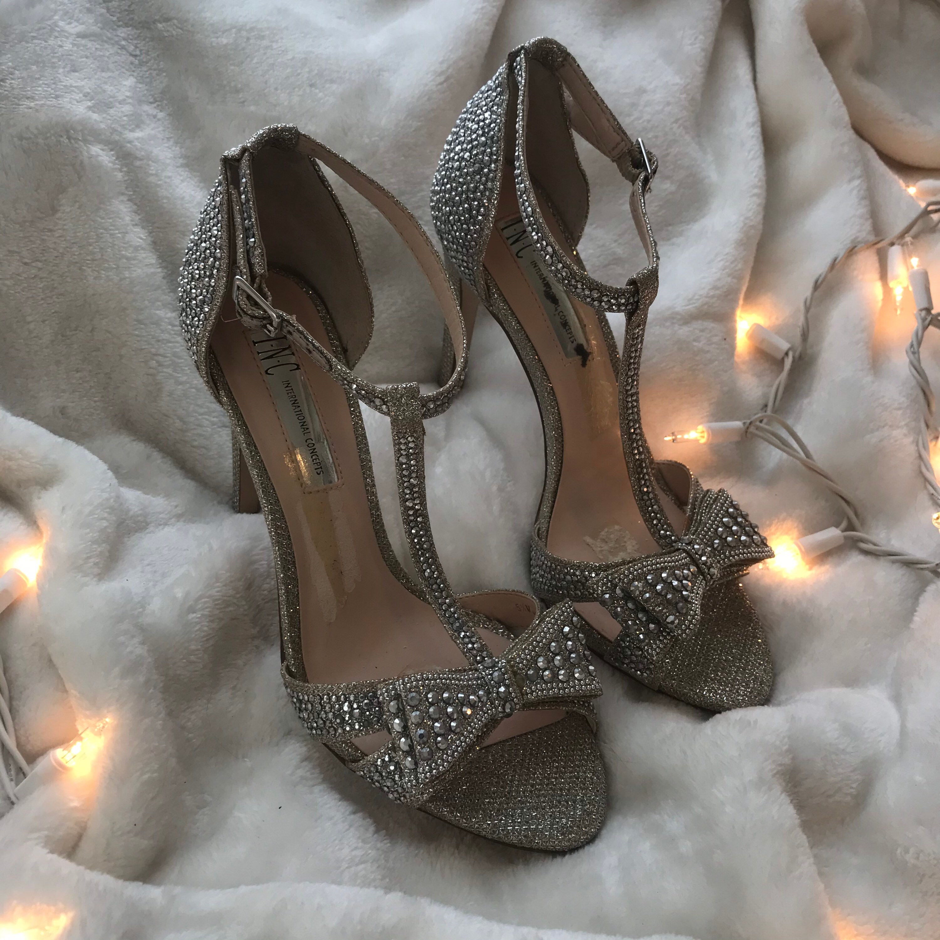silver high heels with bow
