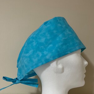 Blue scrub cap. Plain scrub cap. Unisex scrub cap. Baby blue scrub cap. Cotton scrub cap.
