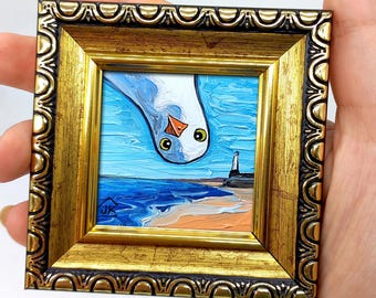 Cuadro de Gaviota Divertida: Arte Marino enmarcado en miniatura (2x2)