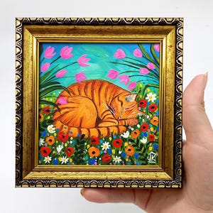 Sleeping orange cat painting Cozy framed wall art Colorful flowers Cute cat lover gift Bright home decor by Julia Kot