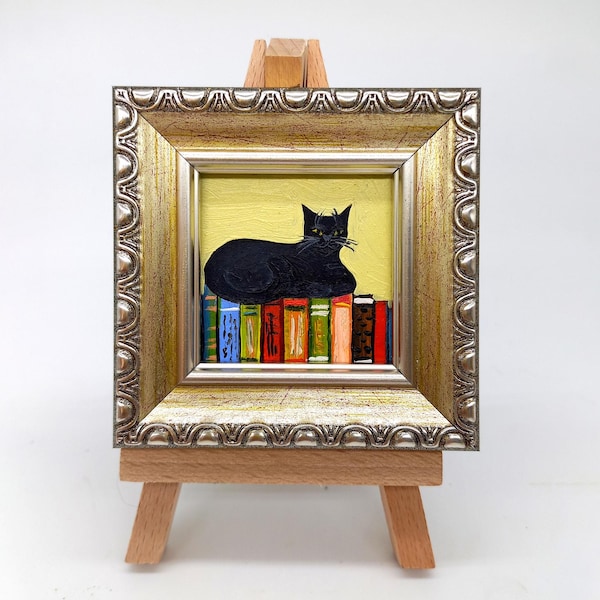 Black Cat Painting: Funny Kitty on Books, Framed Original Art