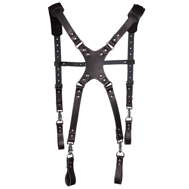 May include: Black leather camera strap with adjustable straps and metal hardware.