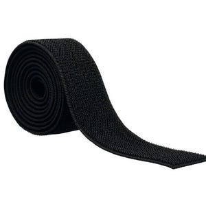 May include: A roll of black hook and loop tape, also known as Velcro, is displayed against a white background. The tape is tightly rolled, with a portion unrolled to show the textured surface. This versatile material is used for fastening.