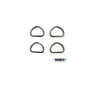 May include: Four silver D-rings, also known as D rings or D-shackles, are arranged in a square pattern on a white background.  WBC Industries, Inc. is printed in black text below the rings.