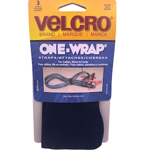 Pode incluir: Velcro One-Wrap, 3 tiras pretas. A embalagem mostra um cabo azul e cabos de jumper presos com as tiras. As tiras medem 58,4 cm de comprimento e 2,2 cm de largura.