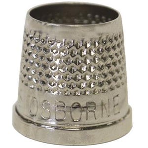 May include: A silver thimble with a textured surface and the word "OSBORNE" embossed on the base. The thimble has a conical shape with a slightly flared rim and is designed for sewing.