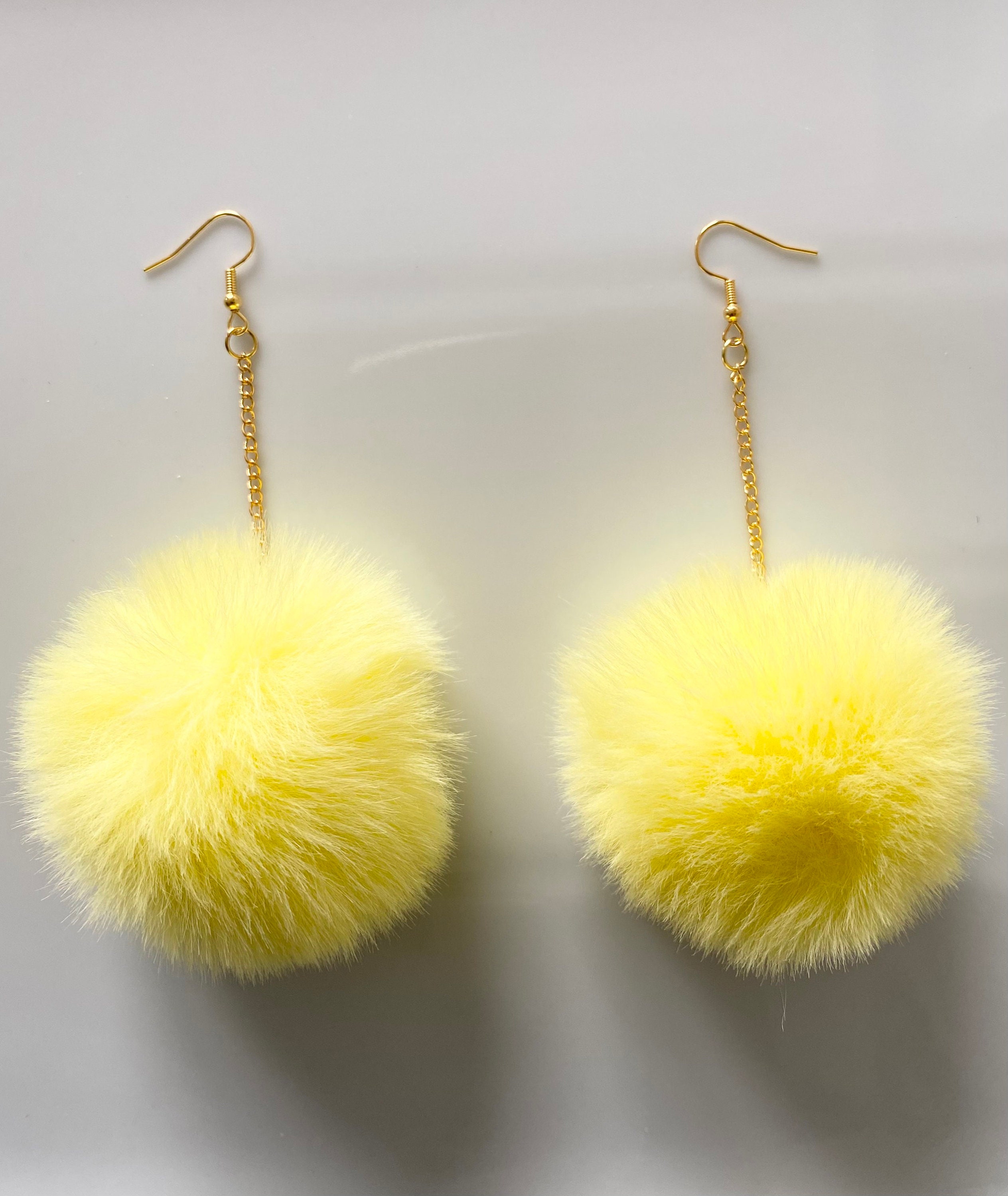 Fluffy pom shop pom earrings