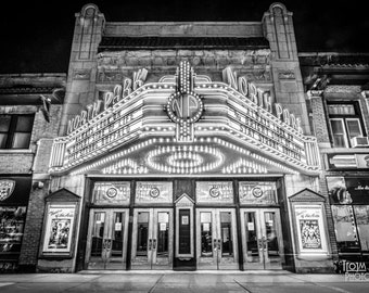 May include: A black and white photo of the North Park Theatre in Chicago, Illinois. The marquee reads "North Park Theatre" and "The Man's Cook of Life" and "The Saving Side of Buffalo".