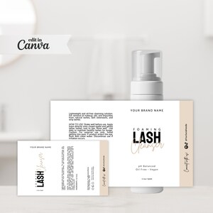 以下が含まれることがあります： 黒いポンプディスペンサーが付いた白いボトルで、「FOAMING LASH Cleanser」と表示されています。ラベルには「YOUR BRAND NAME」と「pH Balanced Oil Free - Vegan 1 fl oz / 50ml」のテキストがベージュで書かれています。