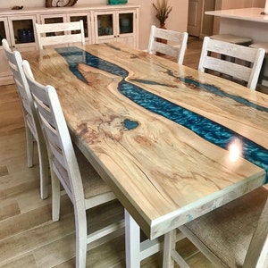 Custom made epoxy resin dining table. Hundreds of color options.