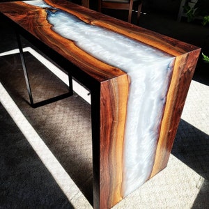 Walnut and epoxy resin waterfall table.