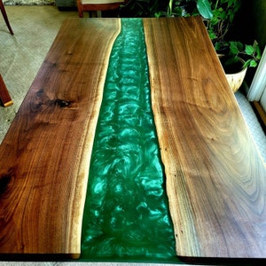 Walnut and epoxy resin table. Made in the United States.