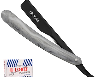 May include: A black and gray straight razor with a marble-patterned handle. The razor has a black plastic handle and a silver blade. The razor is accompanied by a box of 100 new Lord Platinum Saloon razor blades.