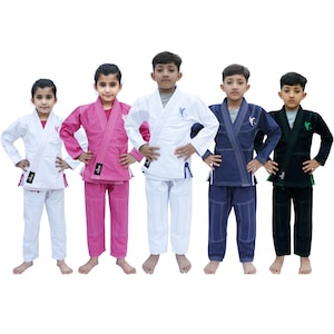 May include: Five children wearing different coloured martial arts uniforms. The uniforms are white, pink, blue, black, and green. The children are standing in a line, looking at the camera.