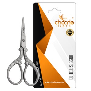 May include: Silver cuticle scissors with an ornate design. The scissors are on a white background with a black and orange graphic and the text "Chocho Track" and "Cuticle Scissor".