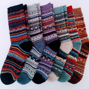 May include: Six pairs of colorful patterned socks with a variety of colors and designs. The socks are made of a soft, comfortable material and are perfect for keeping your feet warm in the winter.